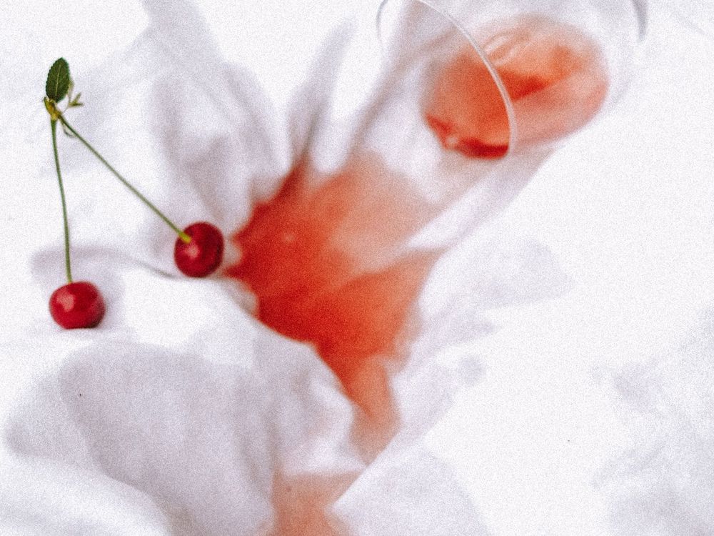 A juice stain spreading on white cloth, the kind of stain we treat spot by spot